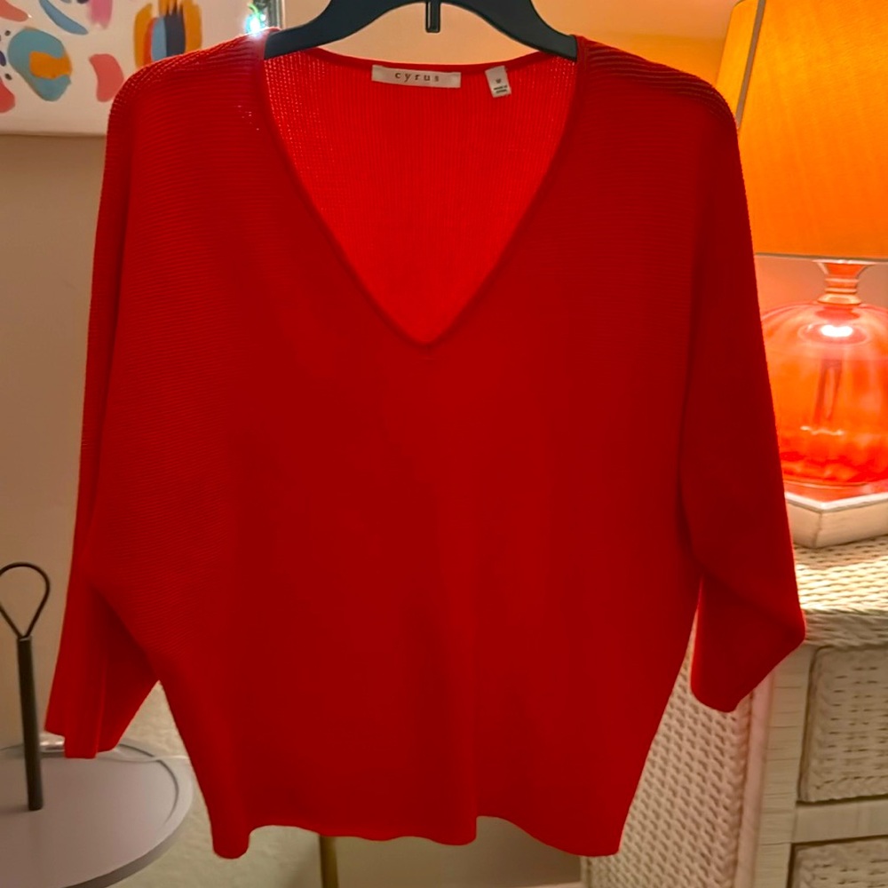Breathable oversized sweater in rust / orange